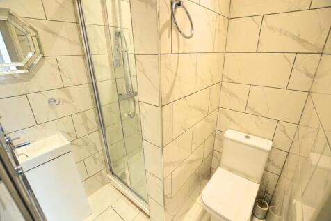 Bright and modern bathroom featuring stylish ma...
