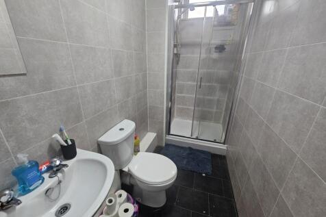 A clean and well-maintained bathroom featuring ...