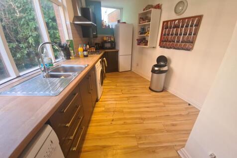 A bright and well-maintained kitchen featuring ...