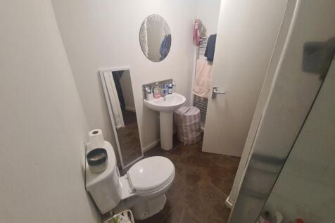 A clean and well-maintained bathroom featuring ...
