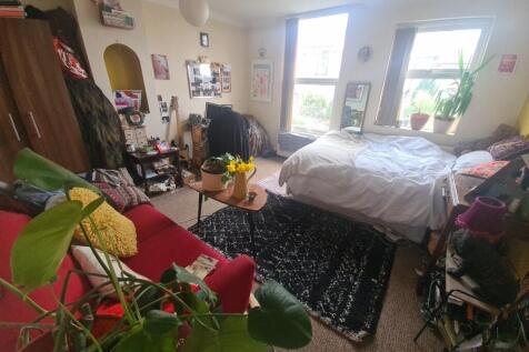 Bright and inviting master bedroom featuring a ...