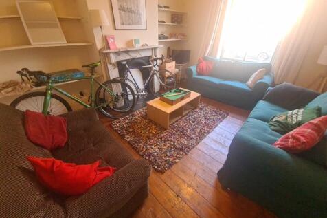 A cozy and inviting living room filled with nat...