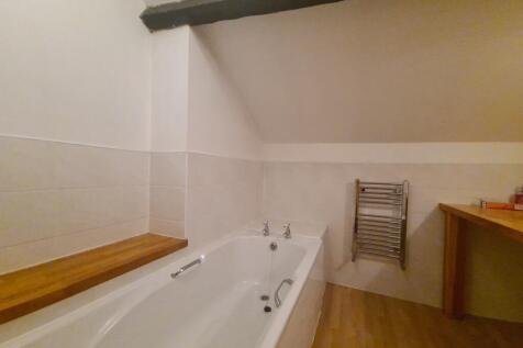 A clean and well-maintained bathroom with a mod...