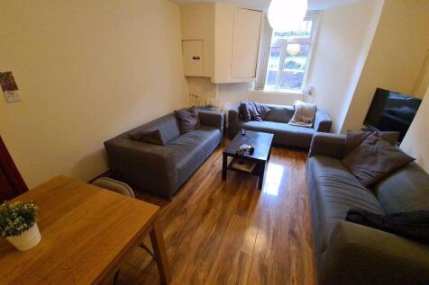 Bright and inviting living room with comfortabl...