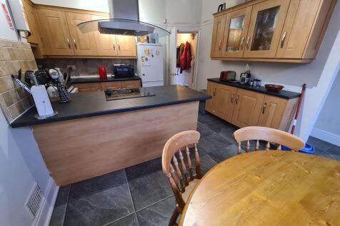 A bright and spacious living room with modern f...