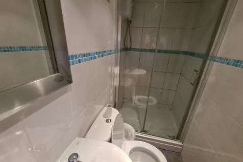 A clean and well-maintained bathroom with a lar...