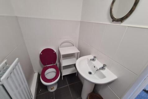 A clean and well-maintained bathroom featuring ...