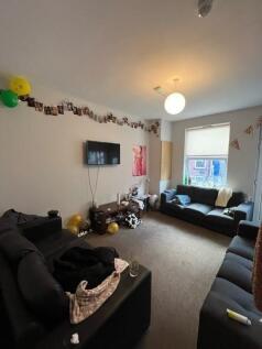 Bright, comfortable communal lounge with three ...