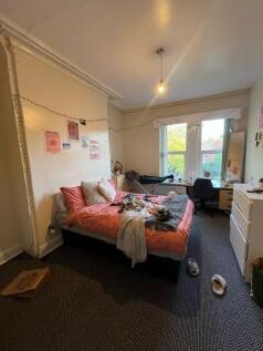 Bright, cosy bedroom with a double bed, large f...