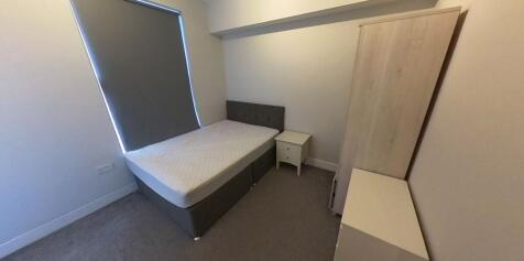 Neatly presented double bedroom with a comforta...