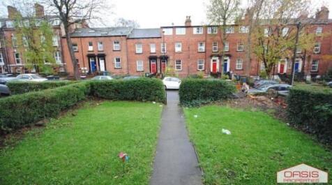 Well-kept front garden with a central path lead...