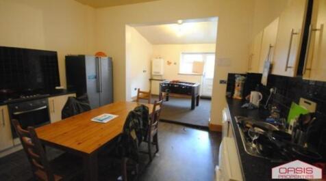 Well-equipped communal lounge with an open-plan...