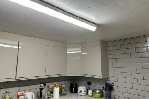 A well-organized kitchen with ample counter spa...