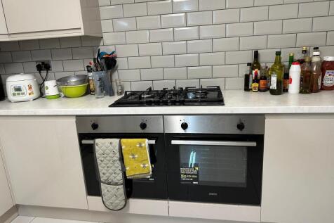 A modern, well-maintained kitchen featuring a s...