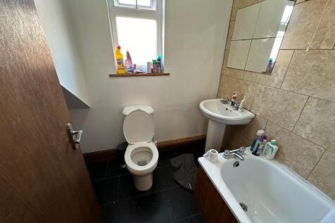 A clean and well-maintained bathroom featuring ...