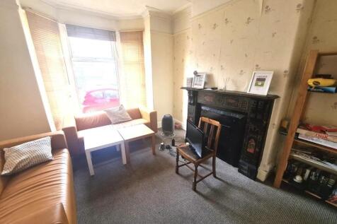 Bright front reception room with a bay window l...
