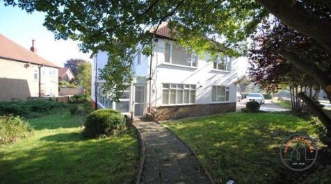 Attractive detached/semi-detached home set back...