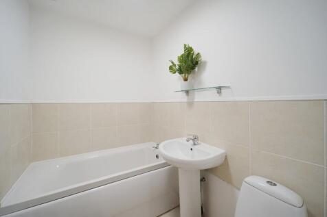Modern, well-maintained bathroom with a clean w...