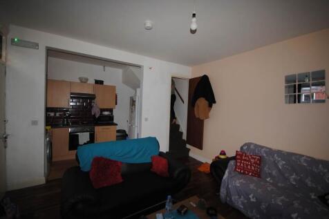 Comfortable open-plan living area opening to a ...