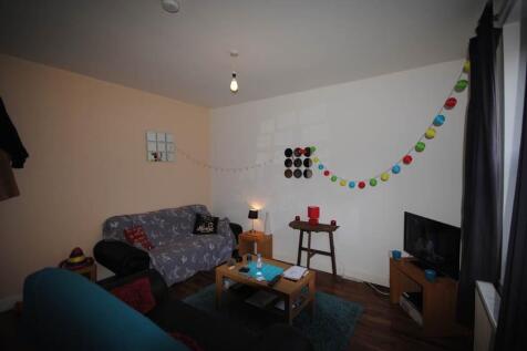 Cozy furnished living room with a sofa, coffee ...