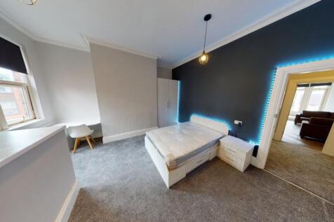 Bright, modern bedroom with a neutral palette, ...