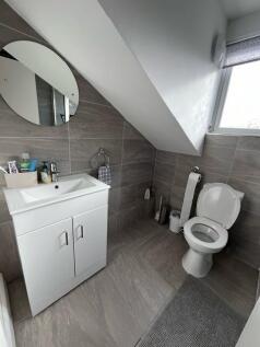 Contemporary bathroom with modern vanity, round...