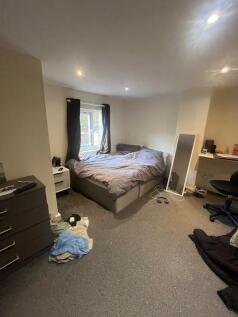 Bright, comfortable double bedroom with a large...