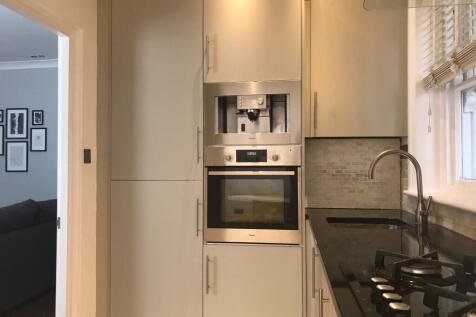 Kitchen with integrated coffee machine
