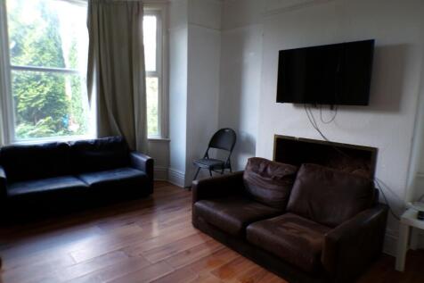 A spacious and inviting large modern living roo...
