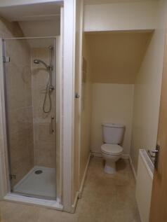 A tidy and functional bathroom featuring a mode...