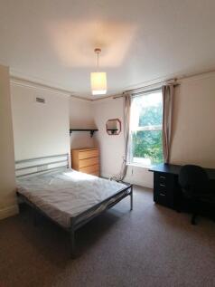 A spacious and bright double bedroom, perfect f...