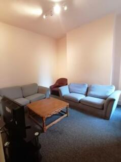 A spacious and inviting large modern living roo...