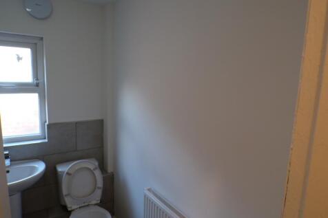 A well-maintained bathroom featuring essential ...