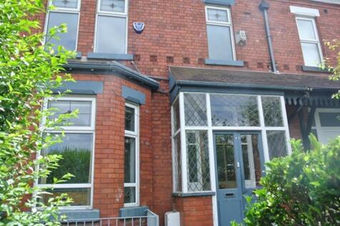 A charming exterior view of the property, featu...