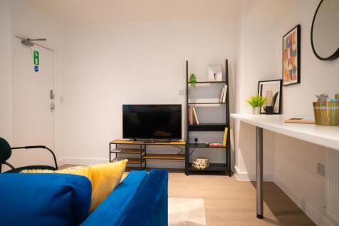 A bright and inviting living room with modern d...