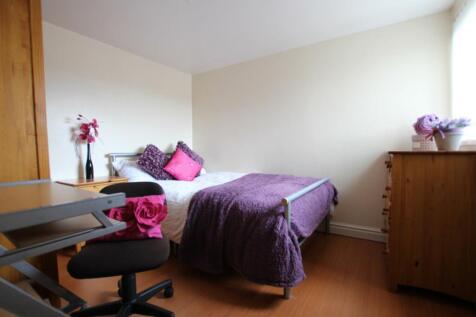 A stylish and inviting double bedroom featuring...