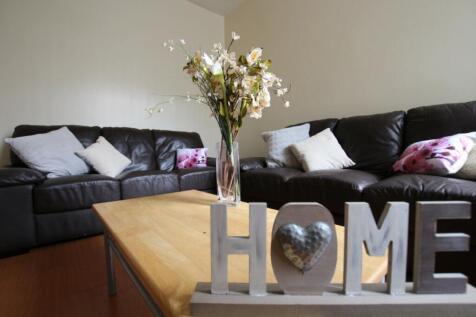 A welcoming living room featuring comfortable s...