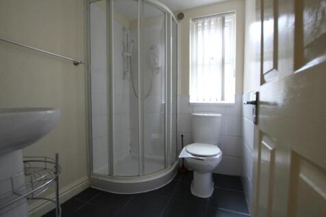 A clean and functional bathroom with a modern s...