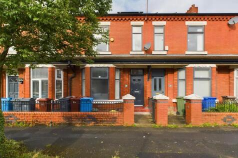 A welcoming exterior view of a charming propert...