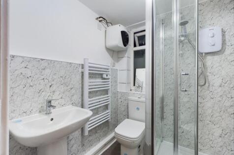 A modern and well-maintained bathroom featuring...