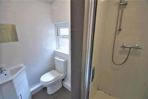 A bright and modern bathroom featuring a clean ...