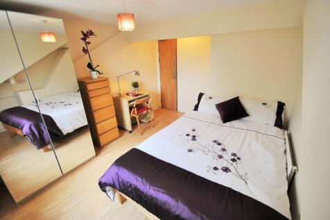 A beautifully designed double bedroom featuring...
