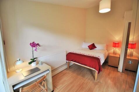 Bright and inviting double bedroom featuring a ...