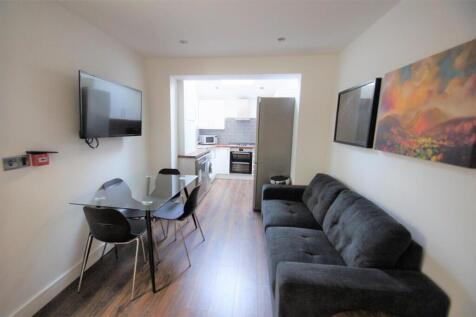A modern and inviting living room featuring a c...