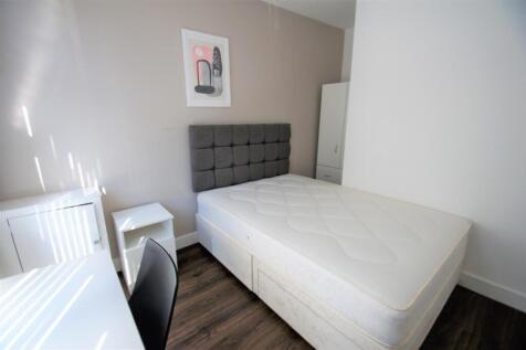 Bright and inviting double bedroom featuring a ...