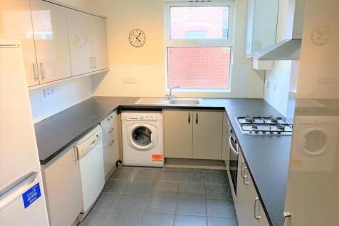 This well-appointed kitchen features modern app...