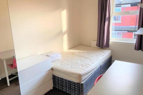 Bright and inviting double bedroom featuring a ...
