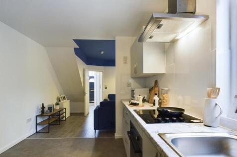 A bright and modern kitchenette, perfect for st...