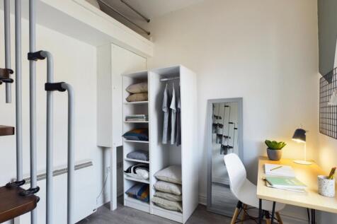 A tidy and well-organized small storage area fe...