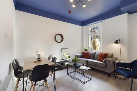 A spacious and stylish modern living room, perf...